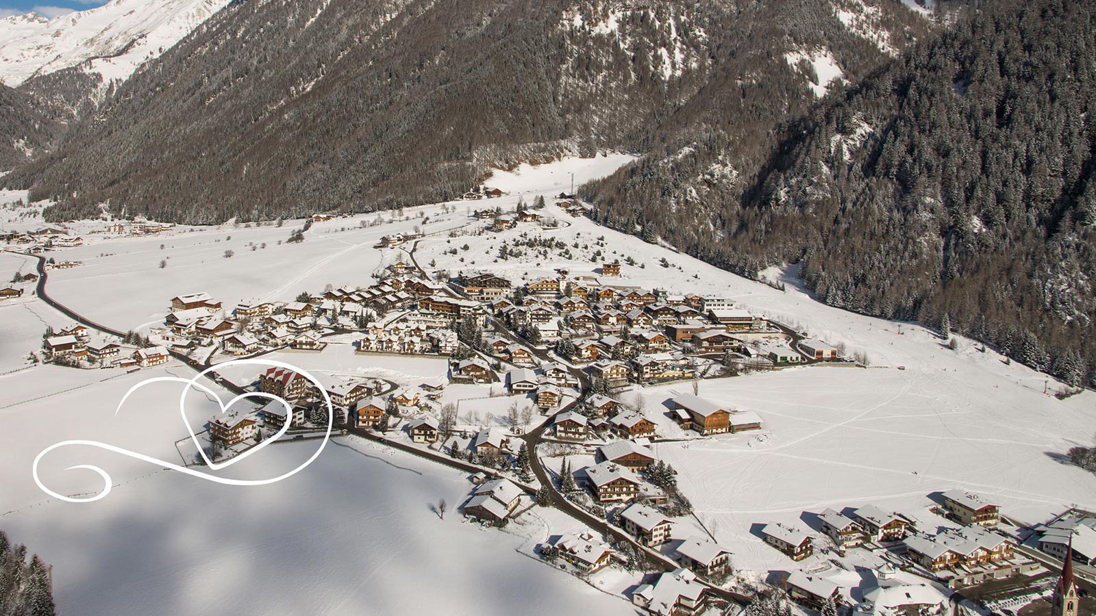 Panoramablick auf das Dorf Vals mit Hinweis auf das Hotel Der Wiesenhof